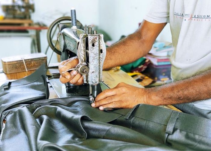 tailor-using-sewing-machine-for-tailoring-fabric-o-2024-11-27-10-57-23-utc (1) (1)